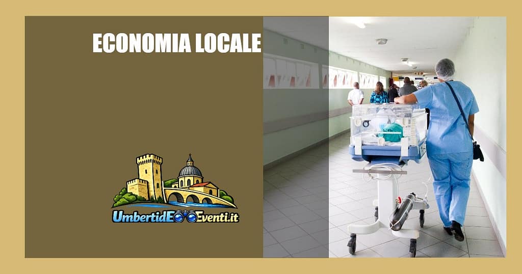 Corsia ospedaliera con operatore sanitario – Concorso OSS Umbria 2026 - UmbertidEEventi.it Operatore sanitario in corsia ospedaliera durante attività assistenziale
